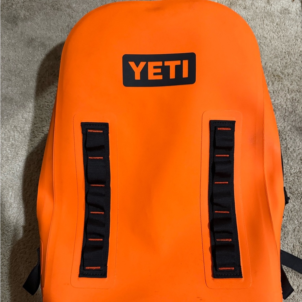 Orange YETI Panga waterproof backpack. Used but in great condition.